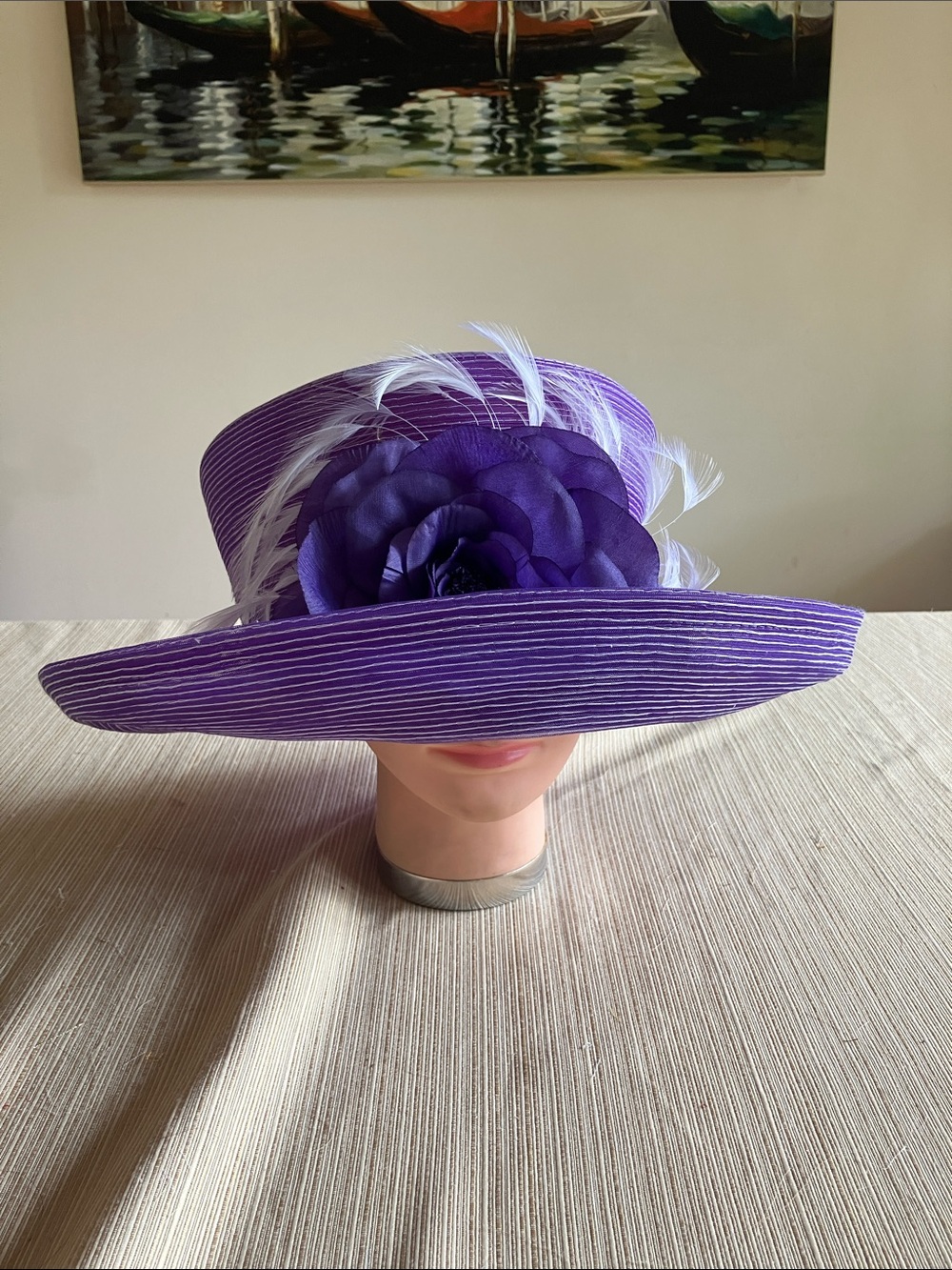 Elegant Purple Wide-Brim Floral Hat With White Feather Accents